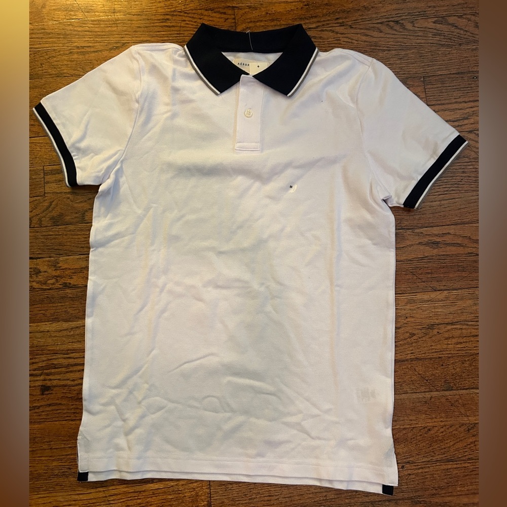 Medium white with dark blue accents